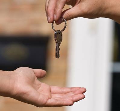 handing over the keys to a property